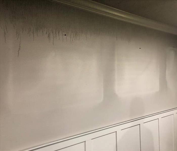 Soot damage on wall.